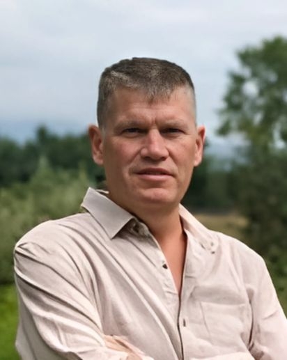 headshot of John Gilman