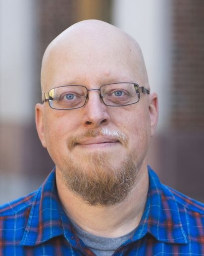 headshot of Paul D. Schmidt