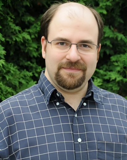 headshot of William Cowen